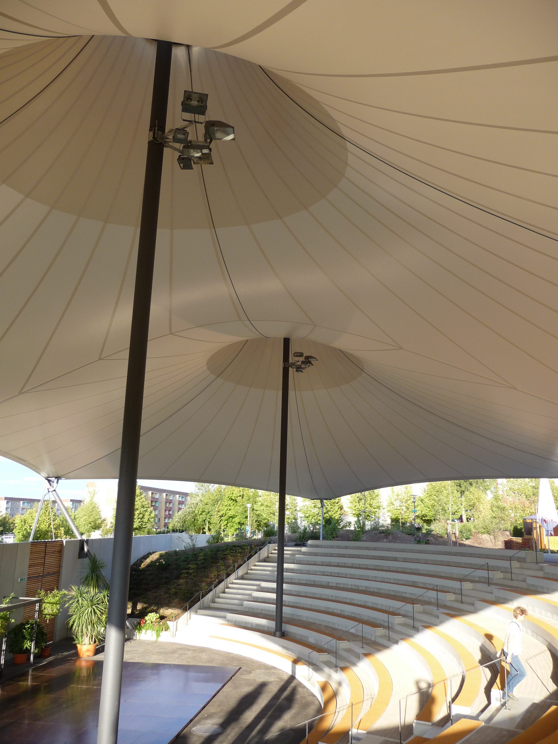 Cable tensioned fabric structure