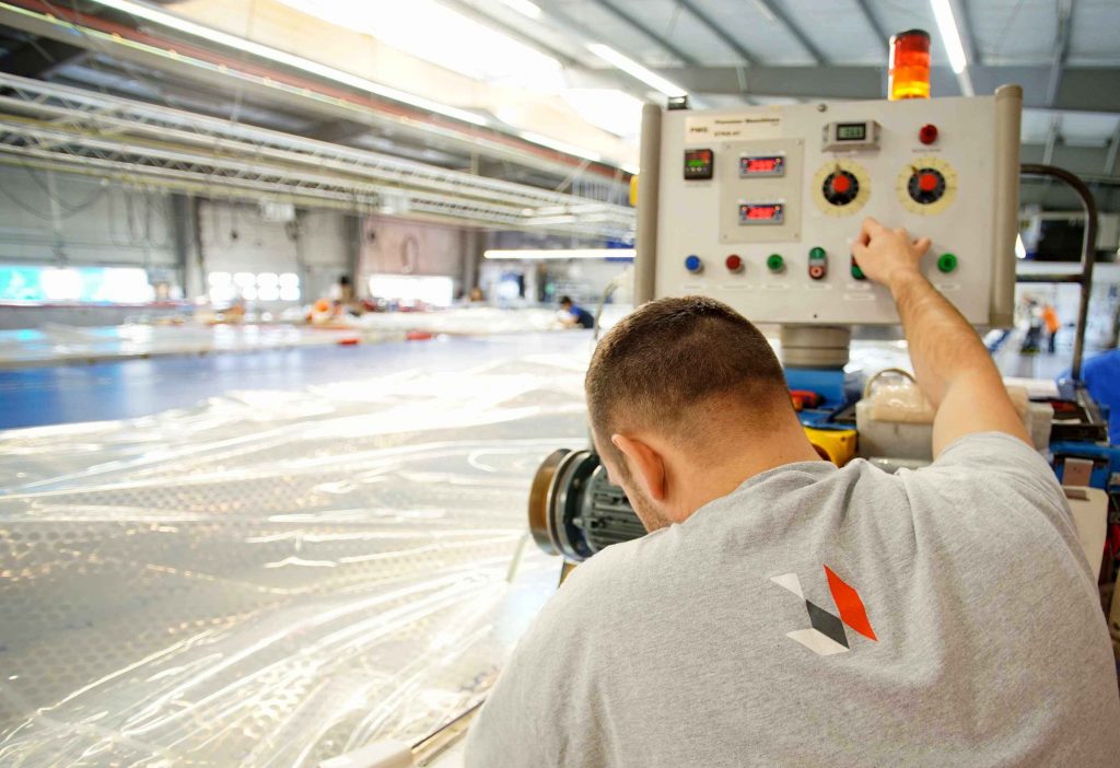Person cutting metal